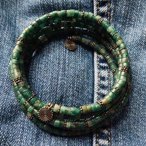 Beaded bracelet - green and antique brass spiral